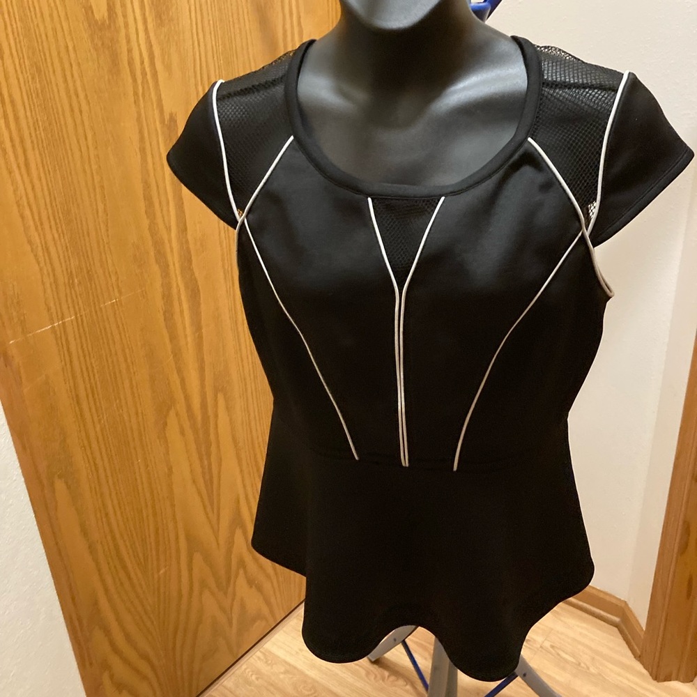 Torrid black and white scuba peplum top